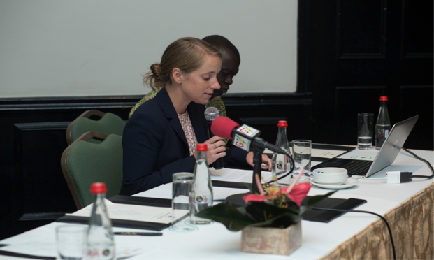 Hannah Ratcliffe and Dr. Easmon Otupiri presenting key findings to participants