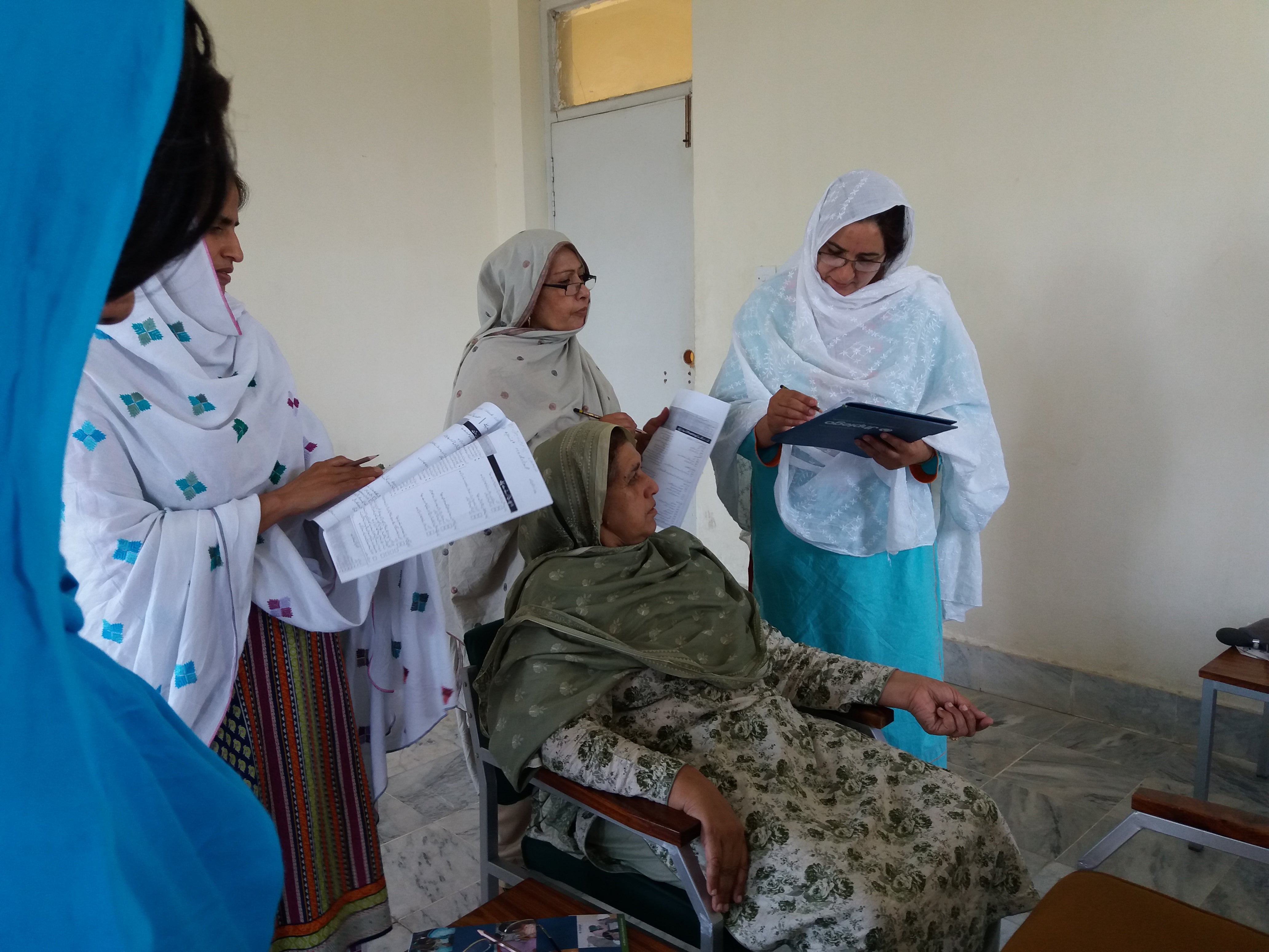 Lady Health Visitors and Community Midwives engaged in interactive role plays to facilitate learning during the Safe Childbirth Checklist training in the province of Khyber Pakhtunkhwa, Pakistan