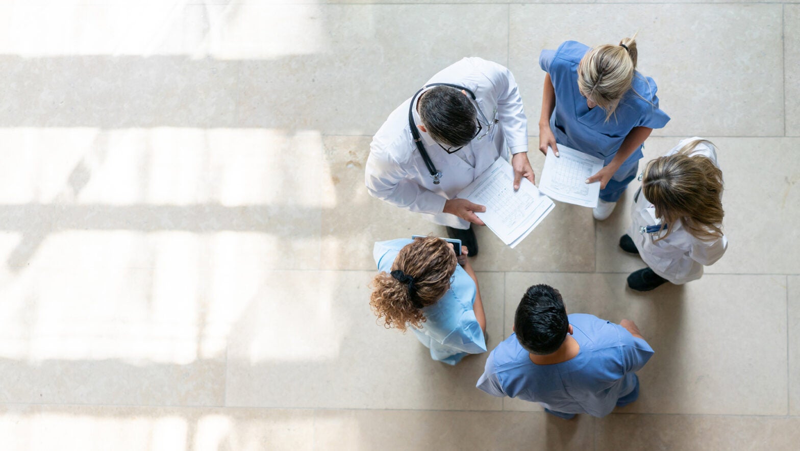 Healthcare professionals during a meeting at the hospital - High angle view